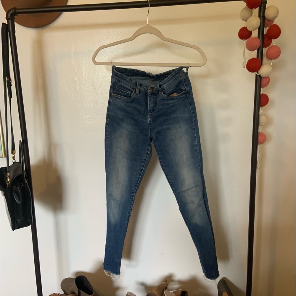 High waisted distressed jeans